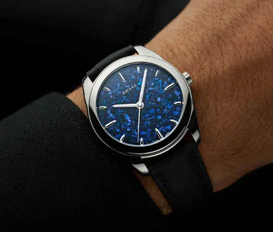 CONTÉVANOU luxury wristwatch with blue textured dial and silver markers on leather strap
