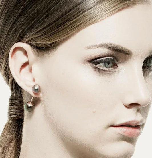 Black earrings from CONTÉVANOU