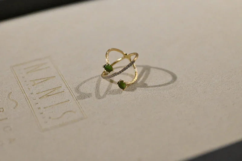 Green gold-tone ring from CONTÉVANOU