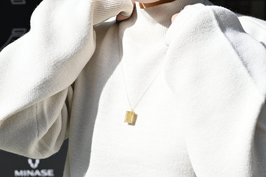 Yellow gold-tone white necklace from CONTÉVANOU