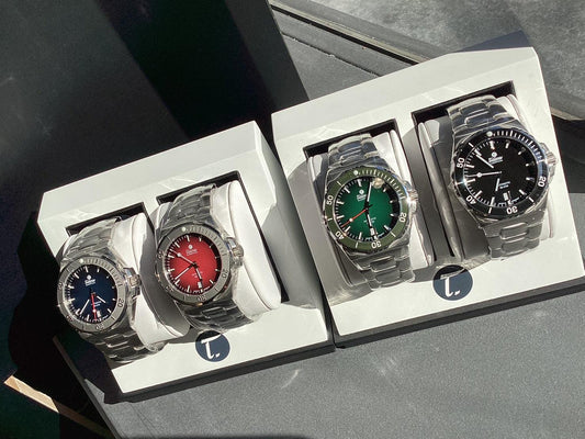 Blue green black red watch from CONTÉVANOU