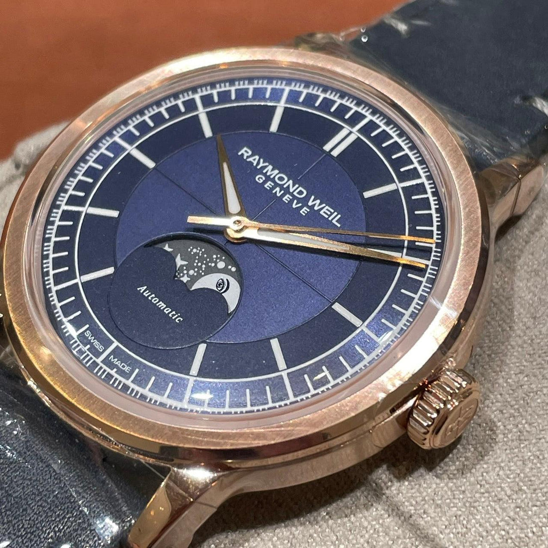 RAYMOND WEIL Swiss automatic watch with blue dial and moon-phase display